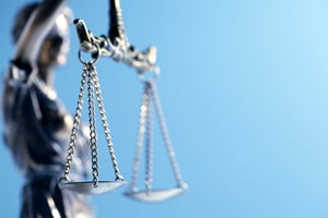 close-up of lady justice holding scales